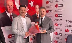 AK Parti'den MHP’ye anlamlı ziyaret 