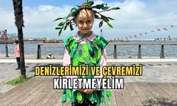 Minik öğrenci kostümüyle  çevre gününe damga vurdu