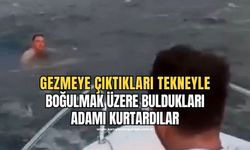 Denizde boğulmak üzere olan şahsın yardımına teknedeki gençler yetişti