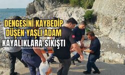 Balık tutarken dengesini kaybetti! Kayalara sıkıştı