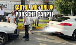 Kartal ile Porsche marka lüks otomobile çarptı!