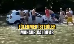 Eğlenmek için girdikleri derede mahsur kaldılar