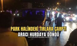 Park halindeki tırlara çarpan araç hurdaya döndü