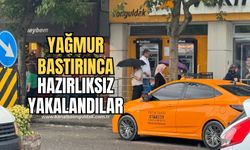 Aniden bastıra yağmura hazırlıksız yakalandılar