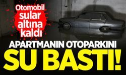 Apartmanın otoparkını su bastı! Otomobil sular altında kaldı