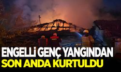 Alevler geceyi aydınlattı: Sobadan çıkan yangında engelli genç son anda kurtuldu