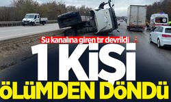 Su kanalına giren tır devrildi: 1 yaralı