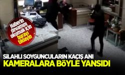 Silahlı ve kar maskeli soyguncuların kaçtığı anlar kamerada