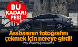 Bu kadarı pes: Arabasının fotoğrafını çekmek için nereye girdi!