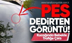 Kucağında bebekle direksiyon başına geçti! Şikayet üzerine işlem başlatıldı