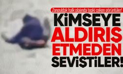 Zonguldak halk plajında kimseye aldırış etmeden seviştiler