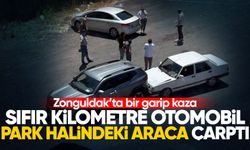 Araç taşıyıcı tırdan indirilen otomobil park halindeki araca çarptı
