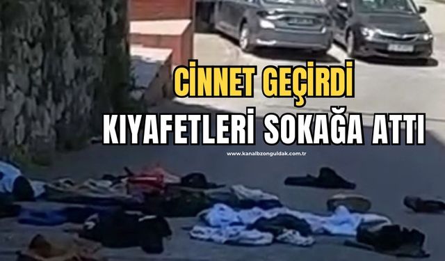 Cinnet geçirdi: Kıyafetleri camdan aşağıya attı!