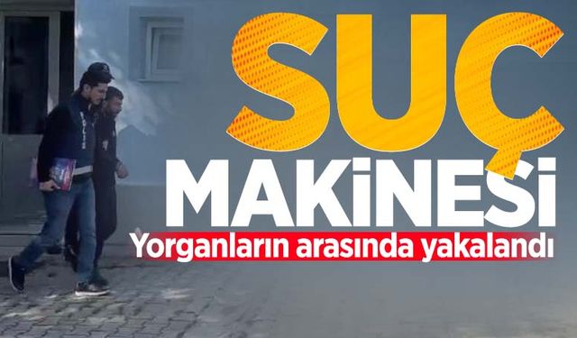 Suç makinesi yorganların arasında yakalandı!