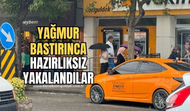 Aniden bastıra yağmura hazırlıksız yakalandılar