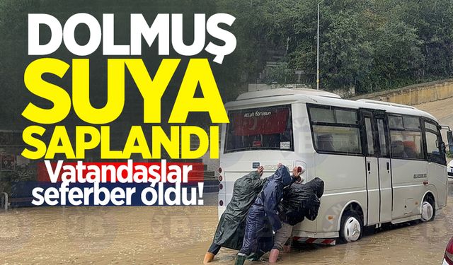 İncivez'de dolmuş suya saplandı! Vatandaşlar seferber oldu