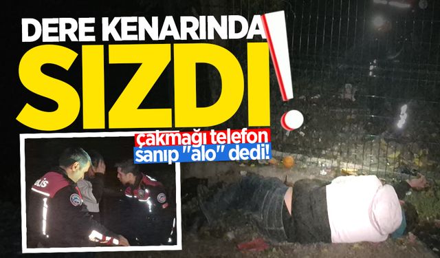 Dere kenarında sızdı, çakmağı telefon sanıp "alo" dedi!