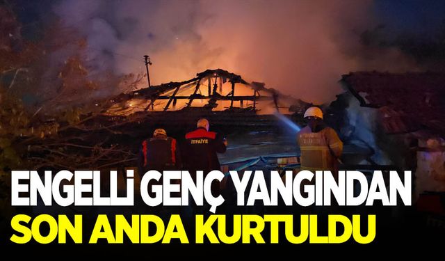 Alevler geceyi aydınlattı: Sobadan çıkan yangında engelli genç son anda kurtuldu