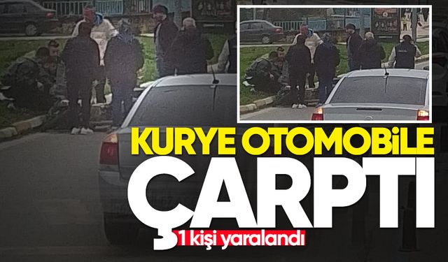 Motosikletli kurye otomobile çarptı: 1 yaralı