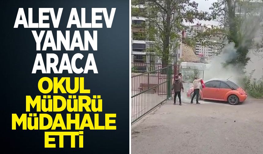 Alev alan otomobile ilk müdahaleyi okul müdürü yaptı