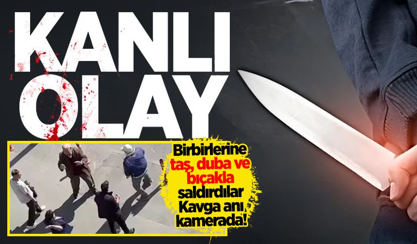 Birbirlerine taş, duba ve bıçakla saldırdılar: Kavga anı kamerada!