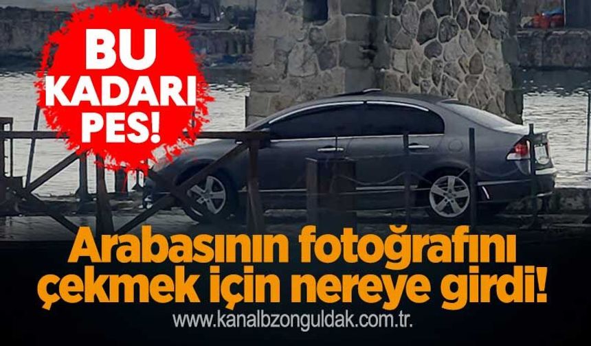 Bu kadarı pes: Arabasının fotoğrafını çekmek için nereye girdi!