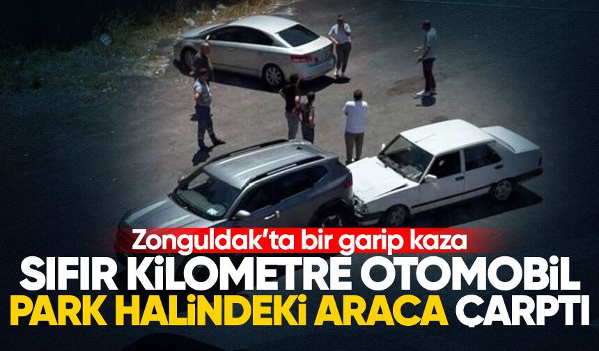 Araç taşıyıcı tırdan indirilen otomobil park halindeki araca çarptı
