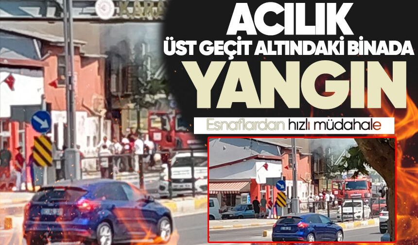 Acılık üst geçit altındaki binada yangın