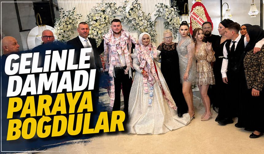 Gelinle damadı paraya boğdular