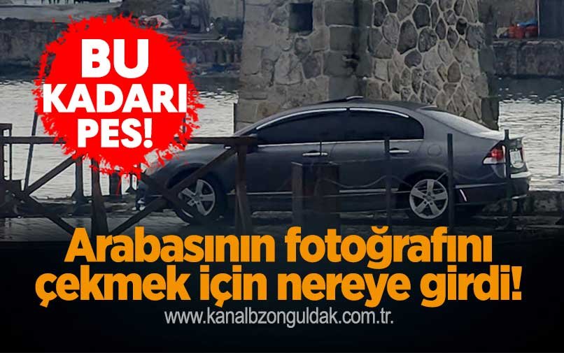 Bu kadarı pes: Arabasının fotoğrafını çekmek için nereye girdi!