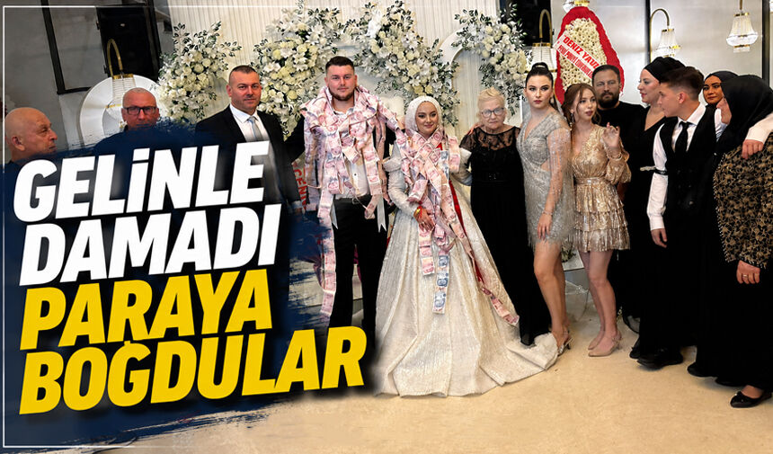 Gelinle damadı paraya boğdular